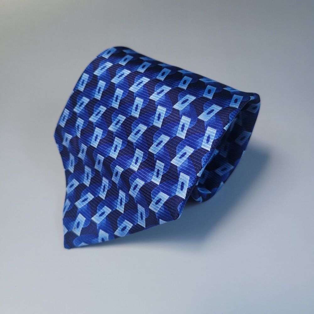 Bijoux Terner genuine silk tie blue geometric wave pattern 60in long 4in wide